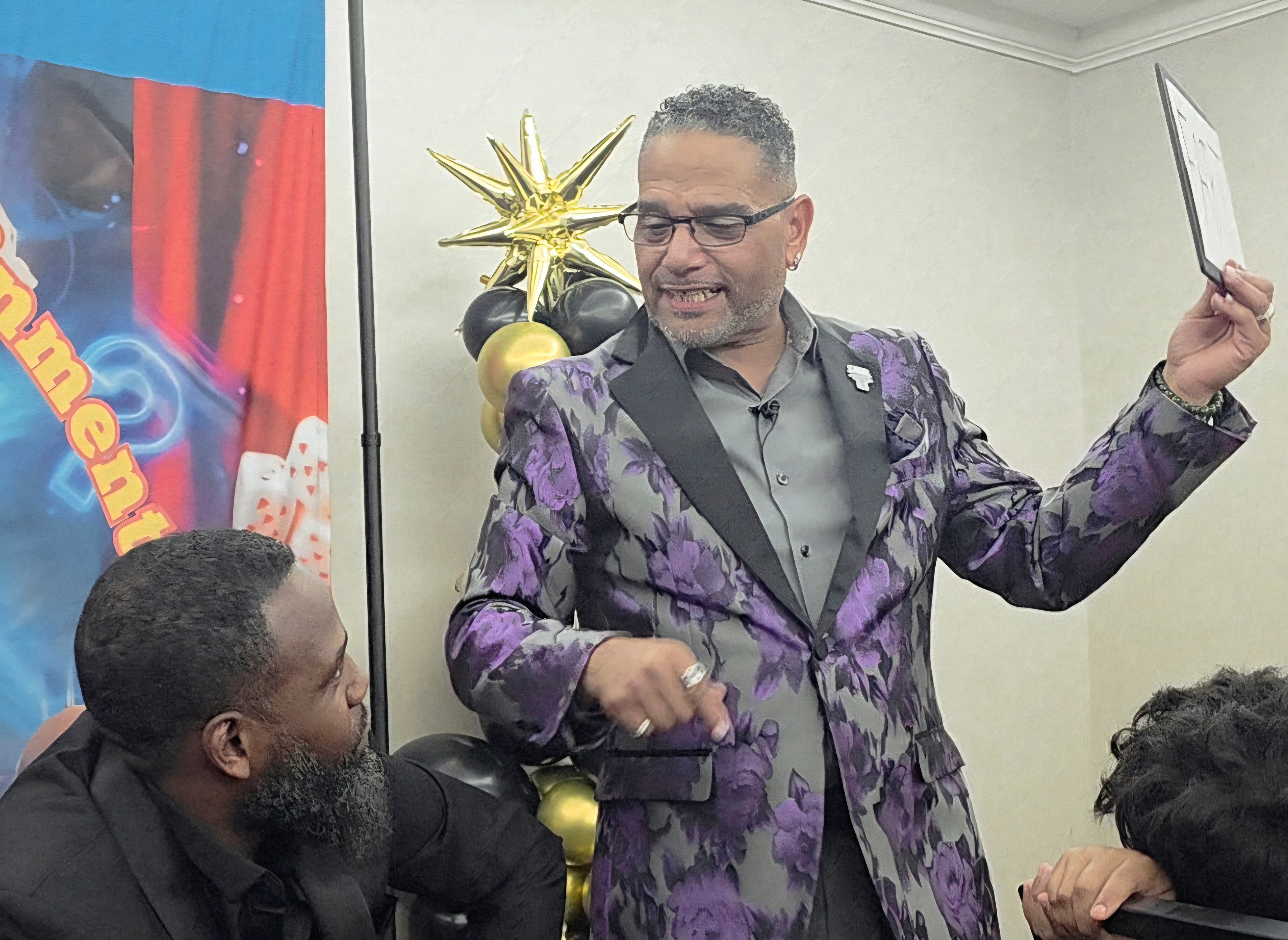 C. Magic performing at the show