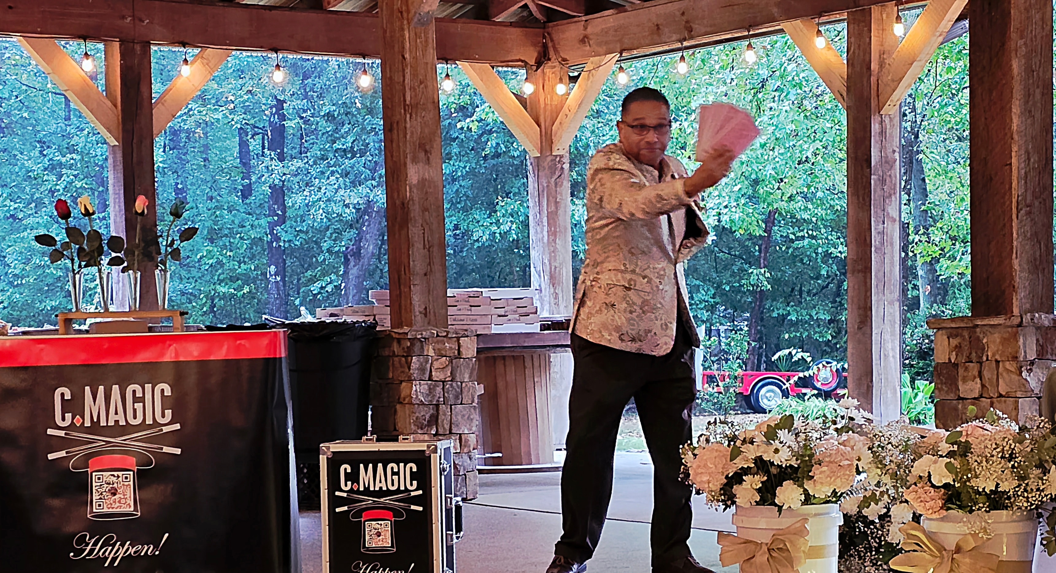 C. Magic officiating as bride and groom hold hands at the altar with bridal party