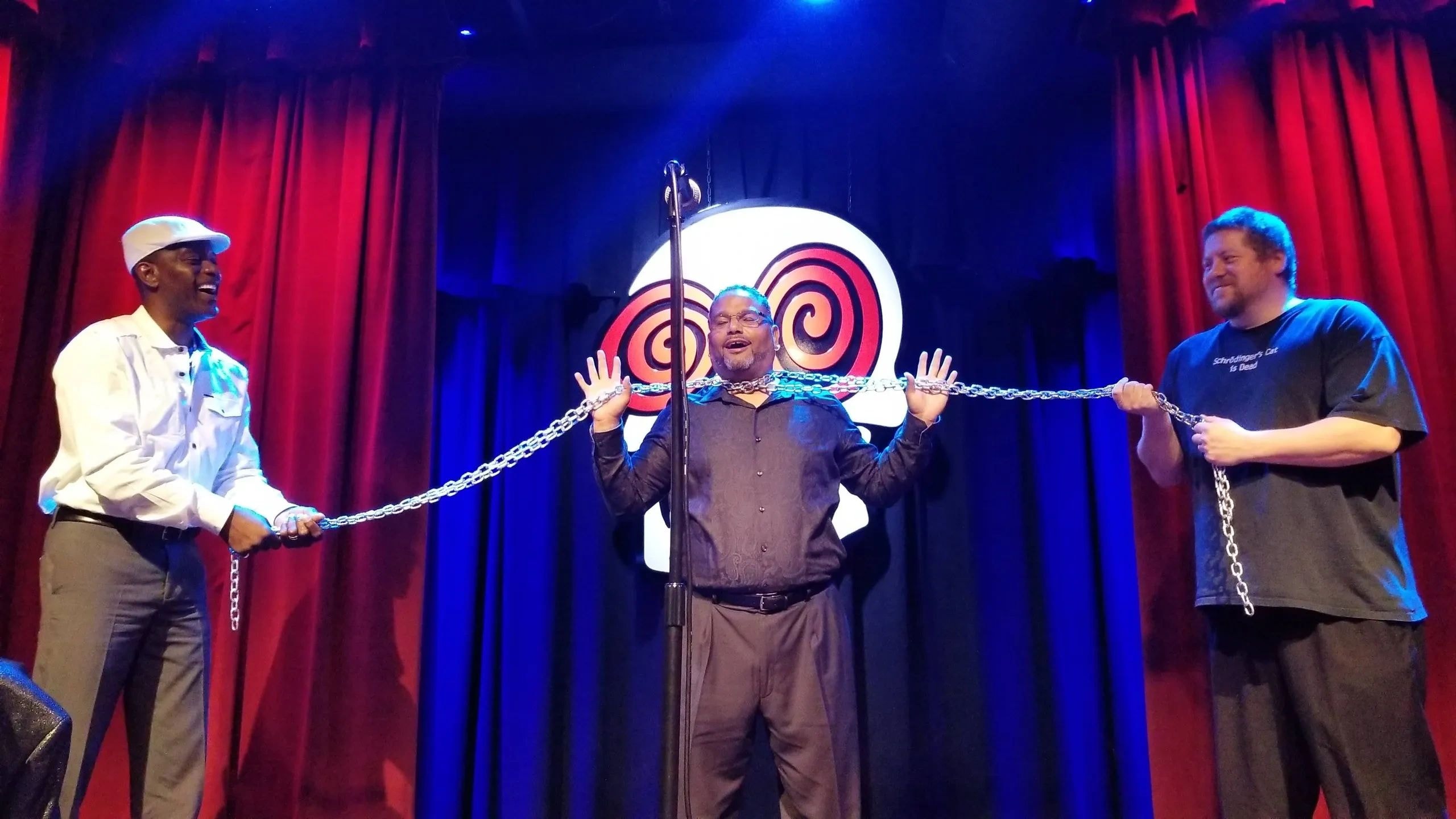 C. Magic performing chain escape stage illusion